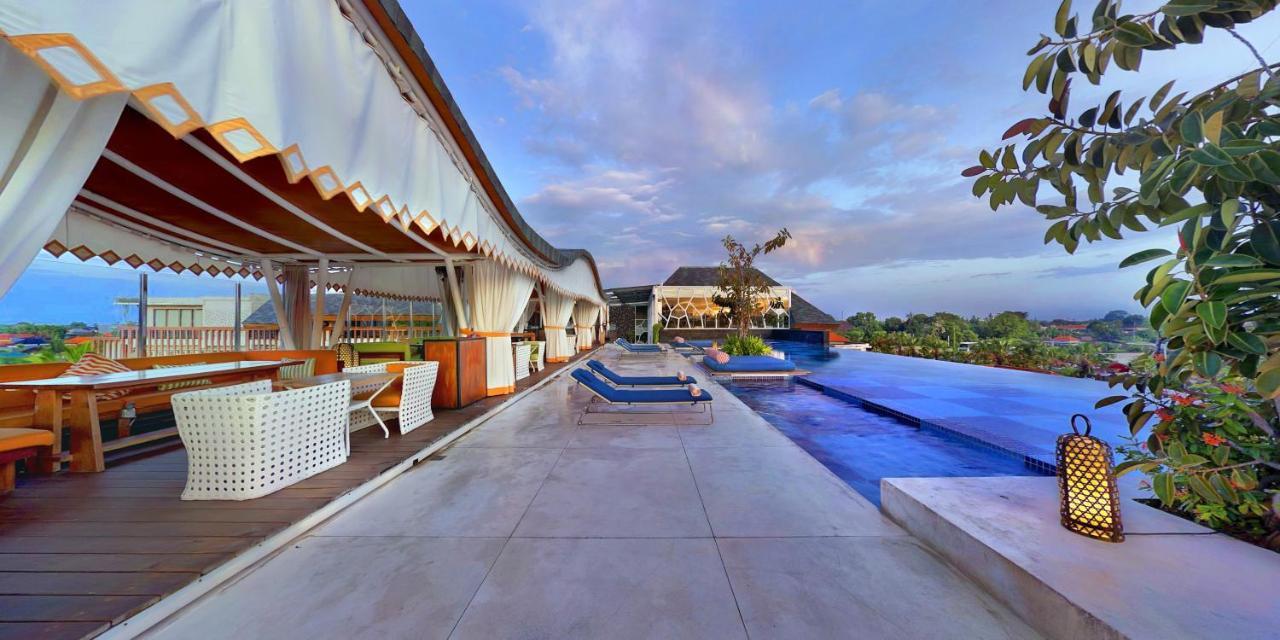Ts Suites Seminyak  Exterior photo The rooftop pool at the hotel