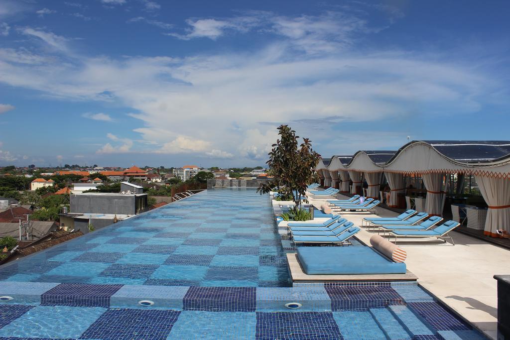 Ts Suites Seminyak  Exterior photo The rooftop pool at the hotel